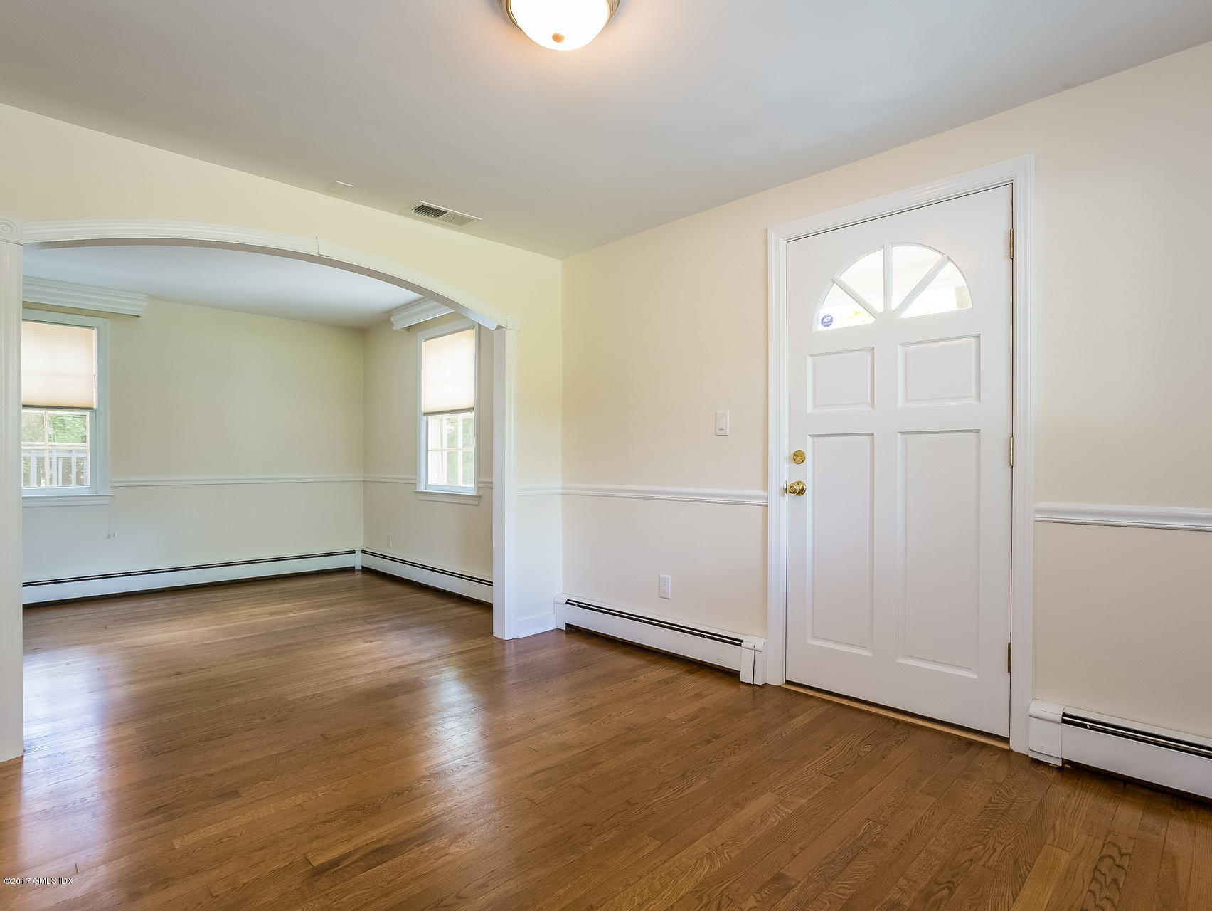 1 Elizabeth Lane Riverside, CT 06878 - Photo 10 of 26 an empty room with wooden floor and windows