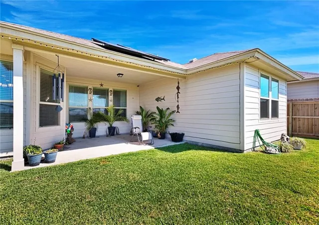 a view of a house with a patio