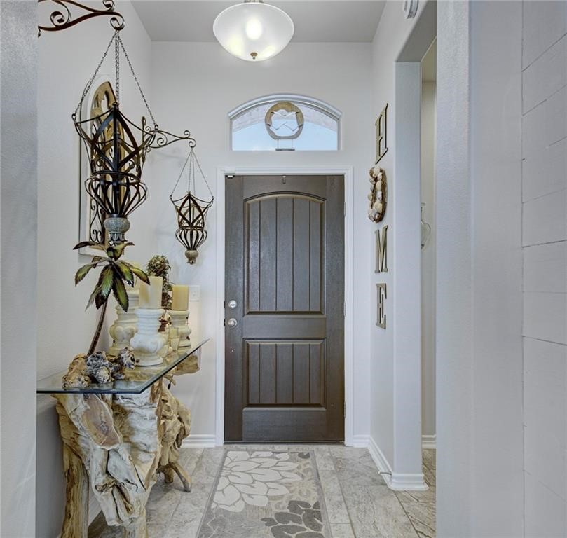 1007 Ocean Breeze Portland, TX 78374 - Photo 4 of 17 a view of a entryway door with wooden floor