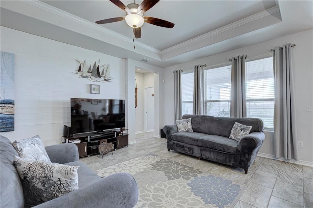 1007 Ocean Breeze Portland, TX 78374 - Photo 5 of 17 a living room with furniture and a flat screen tv