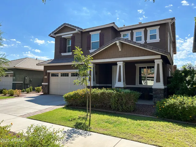 a picture of a bench in front of a wall