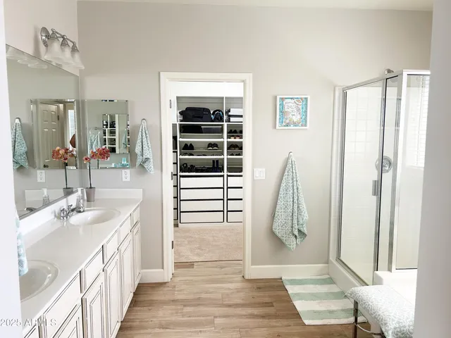 a view of a house with swimming pool and sitting area