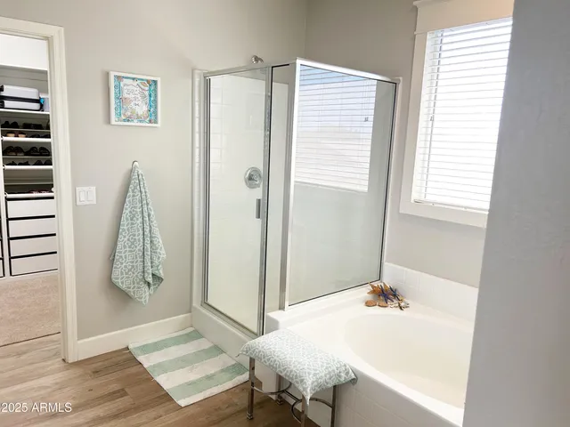 a swimming pool view with a outdoor seating