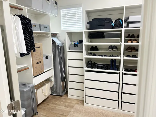 a swimming pool with outdoor seating and yard