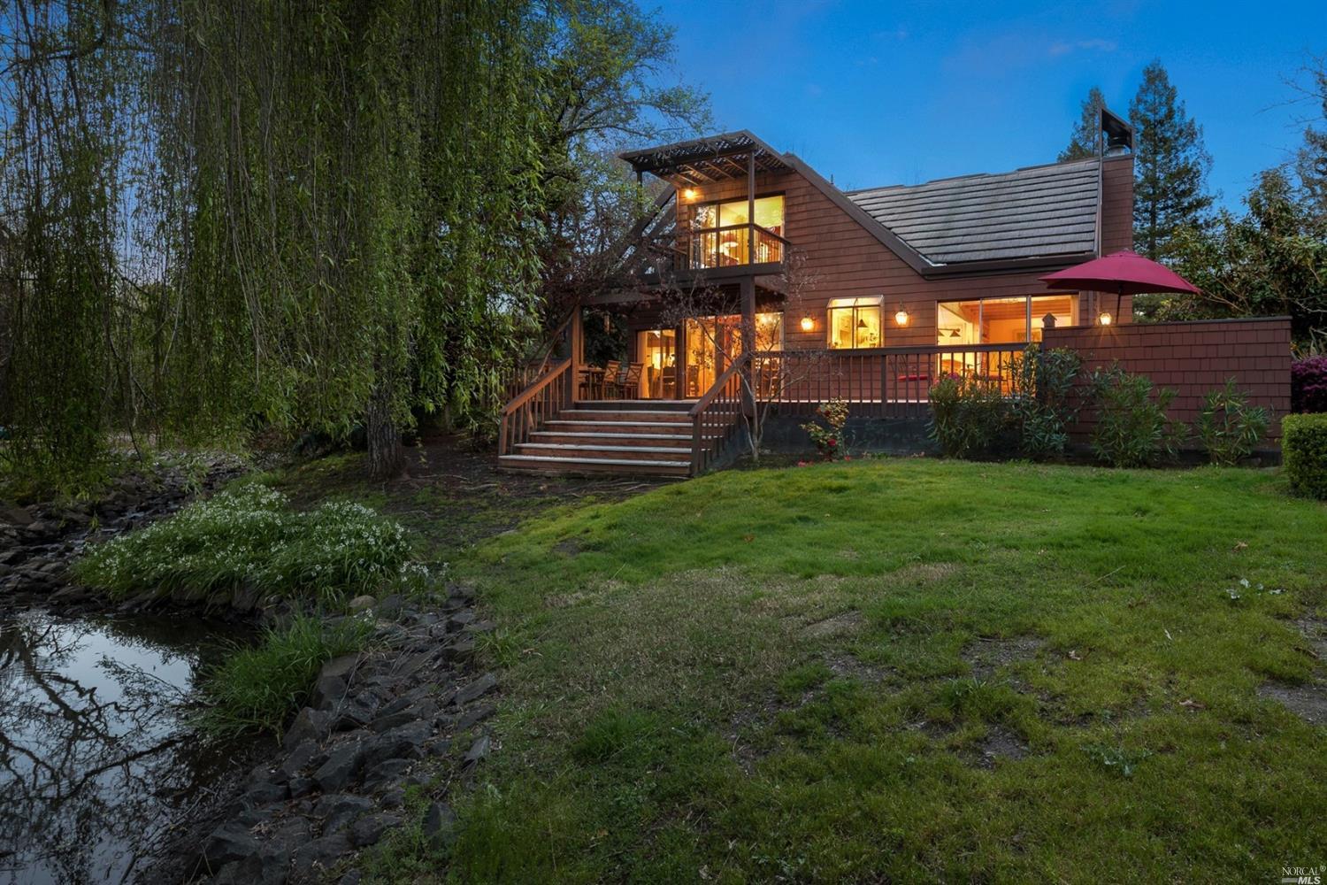 6480 Timber Springs Drive Santa Rosa, CA 95409 - Photo 1 of 1 Twilight on the pond.