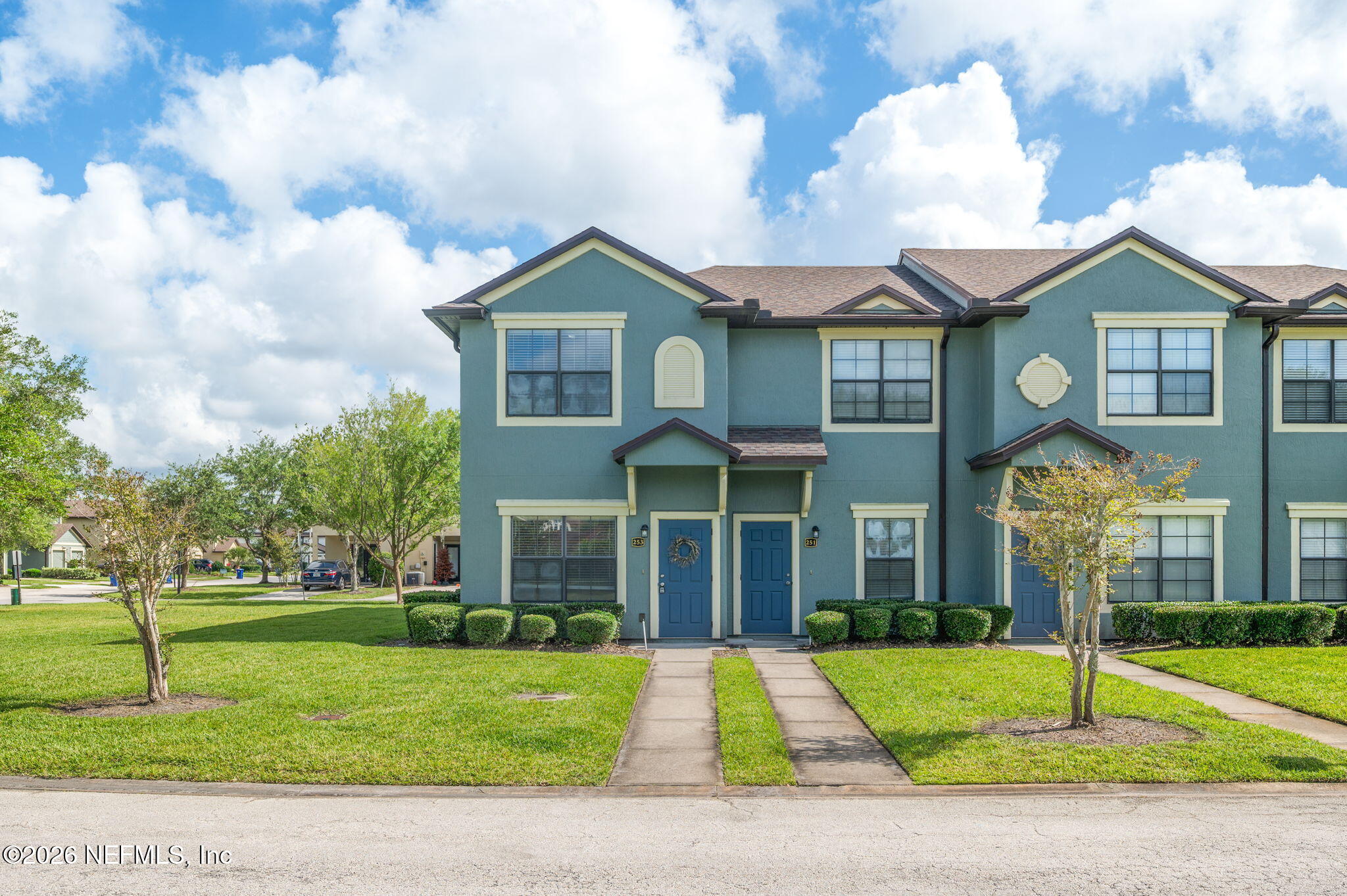 253 Syrah Way St. Augustine, FL 32084 - Photo 2 of 39 a front view of a house with a yard