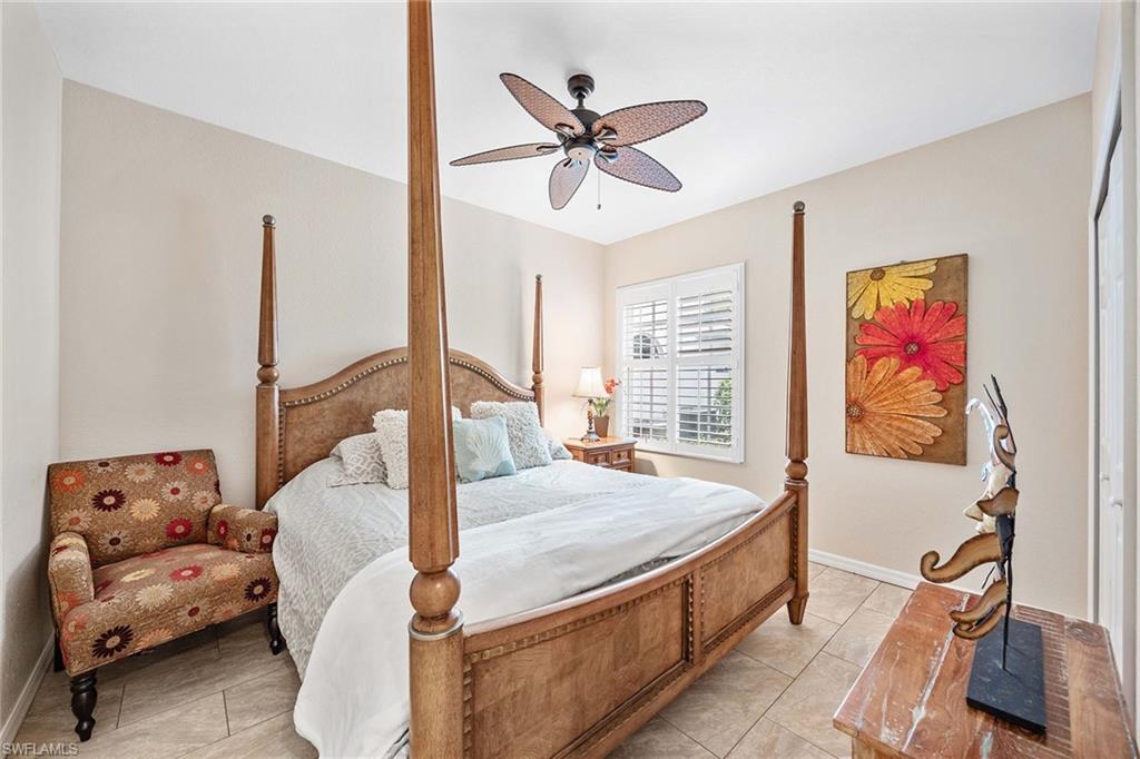 7000 Pinnacle Lane, Unit 1401 Naples, FL 34110 - Photo 17 of 49 a living room with furniture