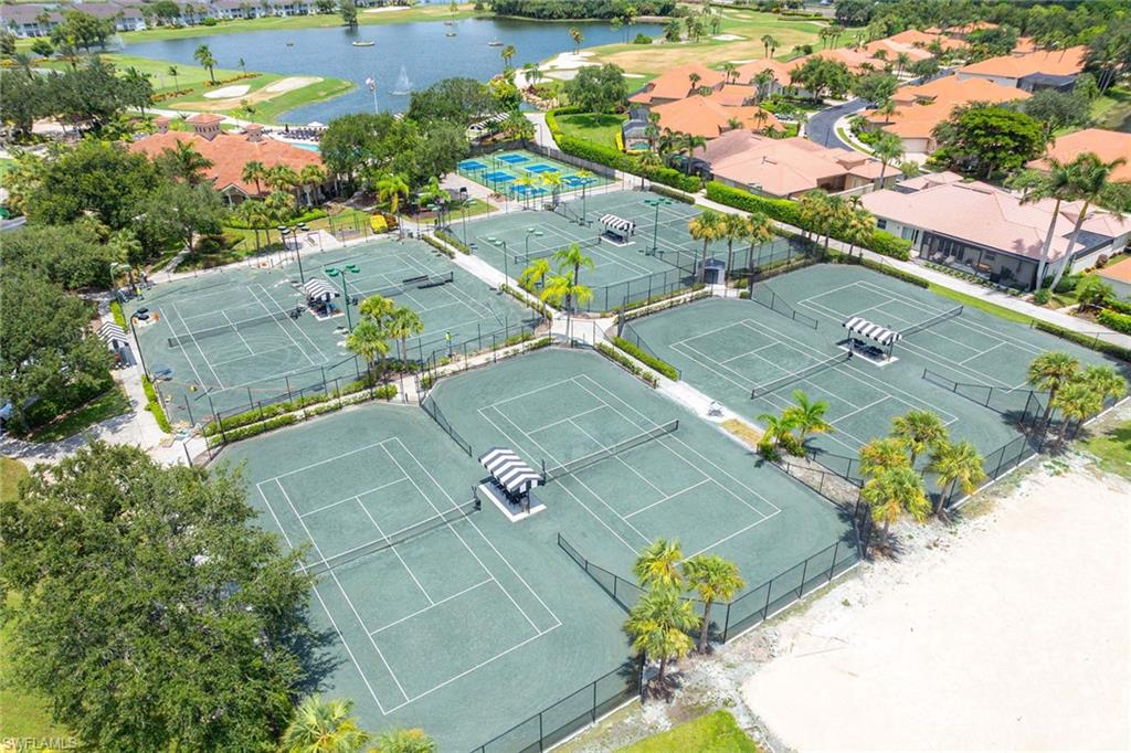 7000 Pinnacle Lane, Unit 1401 Naples, FL 34110 - Photo 35 of 49 an aerial view of residential houses with outdoor space