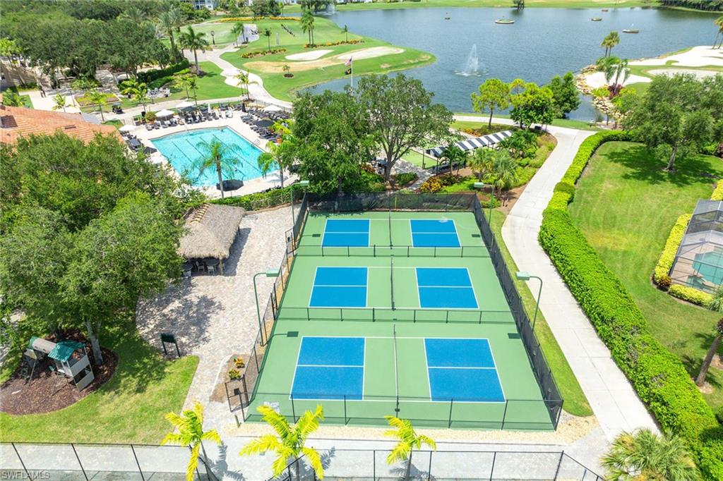 7000 Pinnacle Lane, Unit 1401 Naples, FL 34110 - Photo 36 of 49 an aerial view of a swimming pool