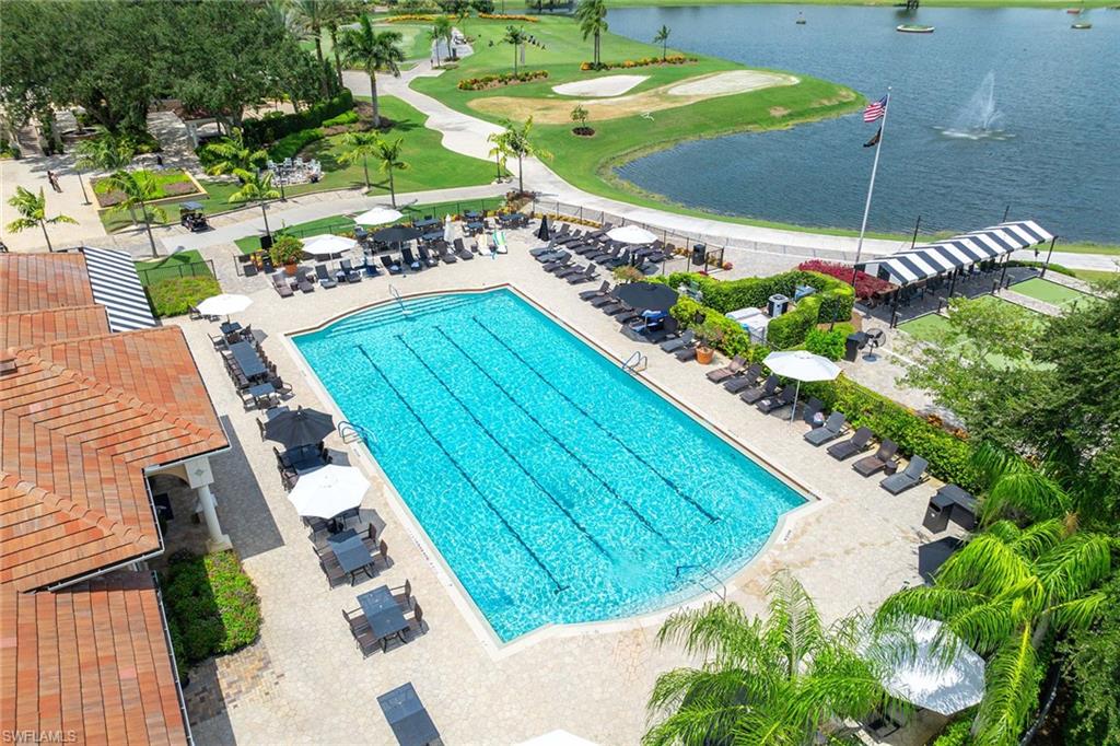 7000 Pinnacle Lane, Unit 1401 Naples, FL 34110 - Photo 37 of 49 a view of a backyard with sitting area