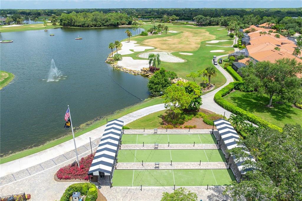 7000 Pinnacle Lane, Unit 1401 Naples, FL 34110 - Photo 39 of 49 an aerial view of a house with a lake view