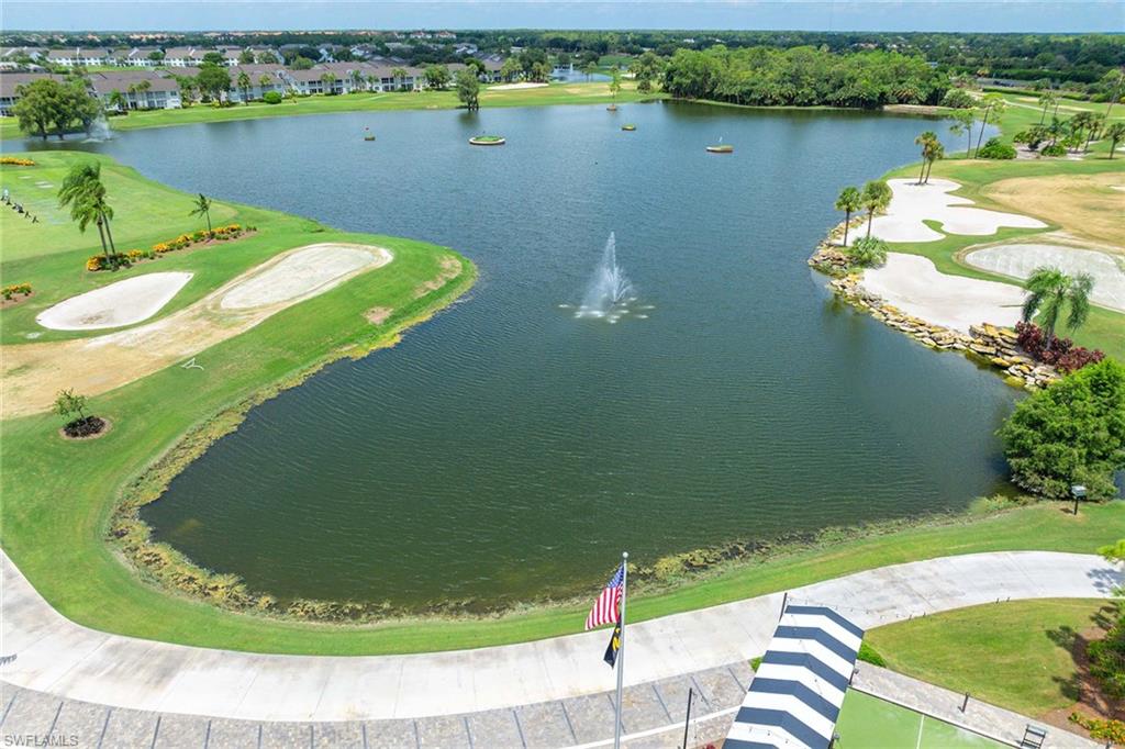 7000 Pinnacle Lane, Unit 1401 Naples, FL 34110 - Photo 40 of 49 a view of a lake from a balcony