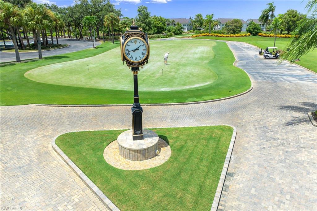 7000 Pinnacle Lane, Unit 1401 Naples, FL 34110 - Photo 41 of 49 a view of a fountain in the garden