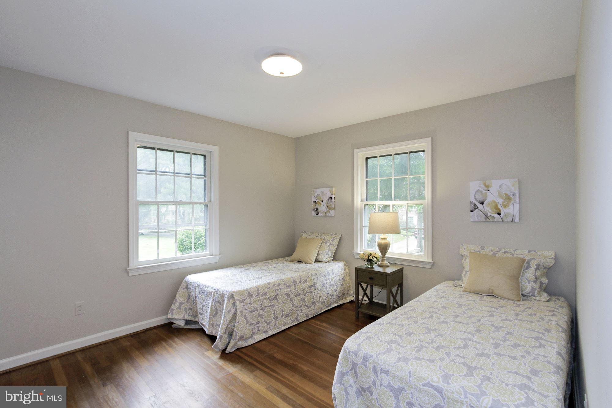 9721 Byeforde Road Kensington, MD 20895 - Photo 22 of 32 LIght-filled Corner Bedroom