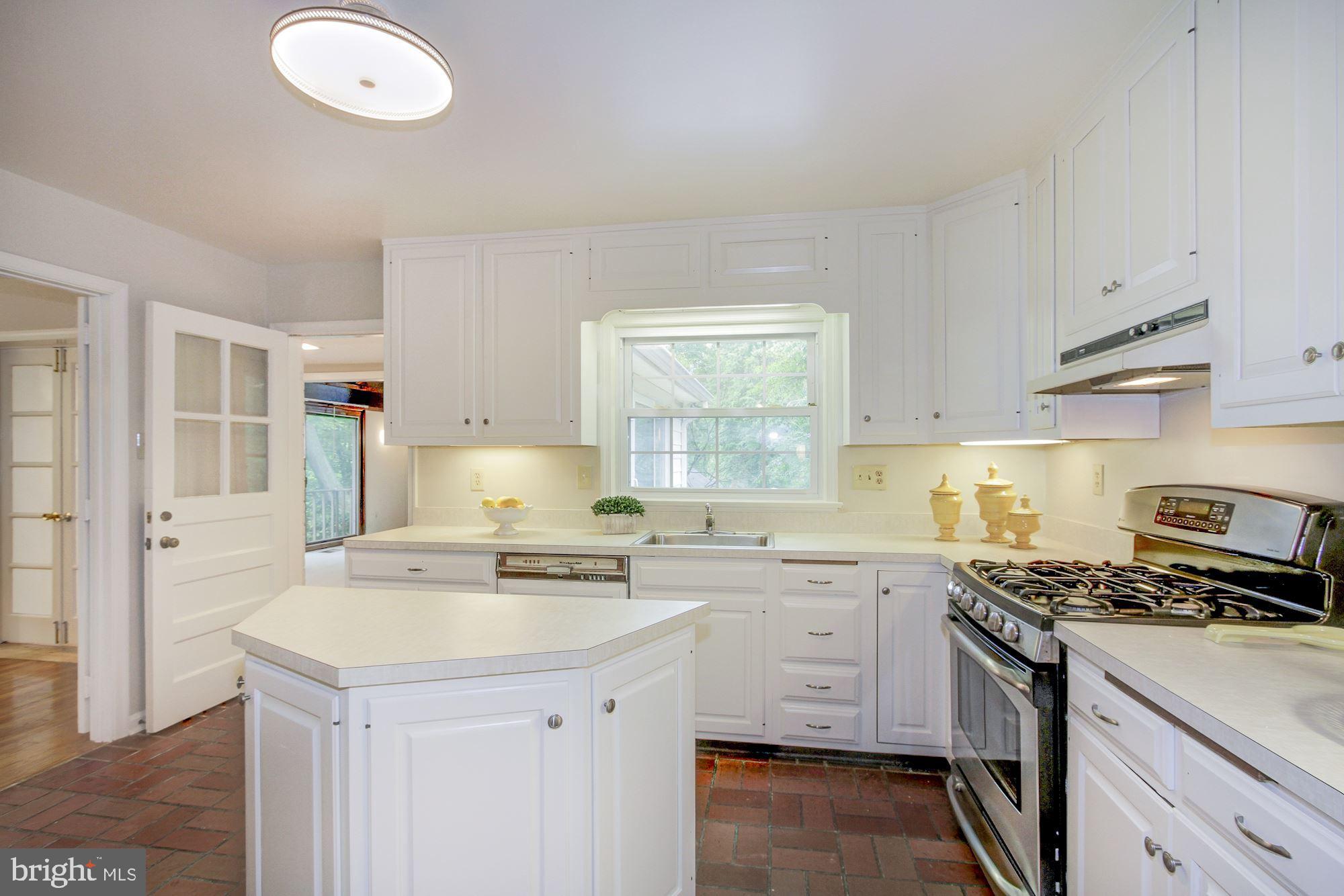 9721 Byeforde Road Kensington, MD 20895 - Photo 8 of 32 Kitchen with Beautiful White Cabinets