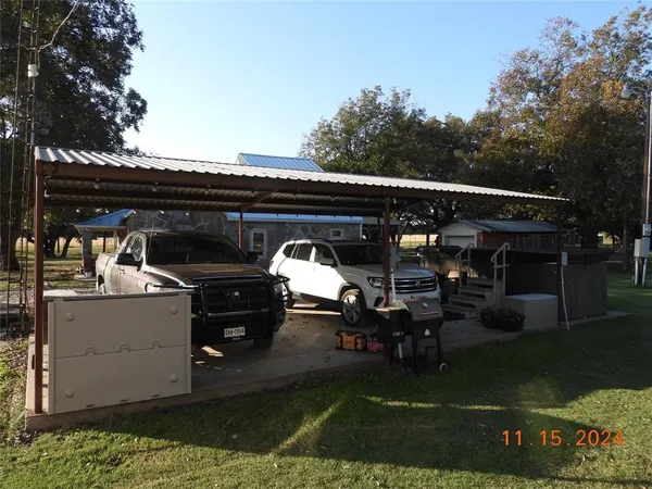 a view of car parked in roof deck