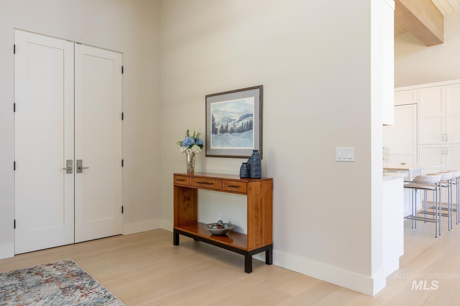 27 Streamside Drive Hailey, ID 83333 - Photo 30 of 39 Entryway featuring light wood-style floors and beam ceiling