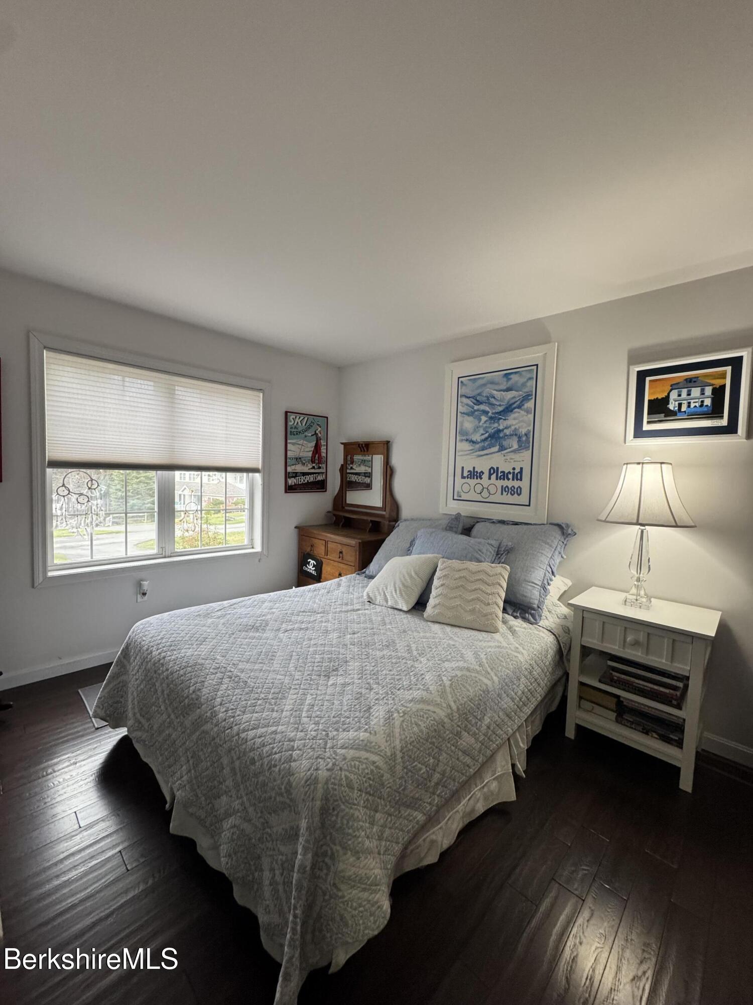 9102 Mountainside Drive Hancock, MA 01237 - Photo 5 of 31 a bedroom with a bed and a window