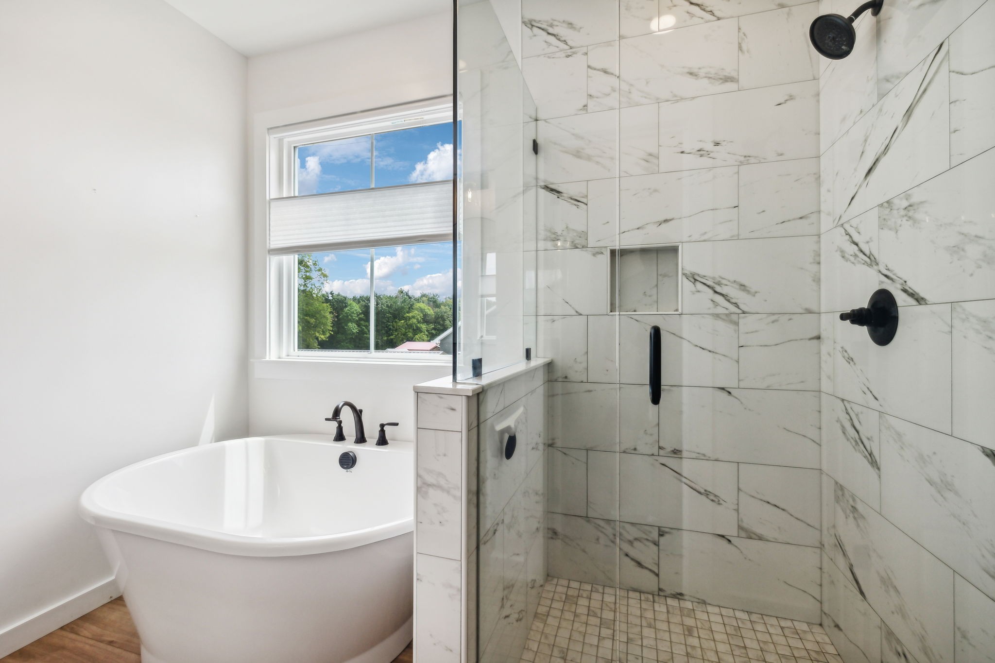 268 Dink Rut Road Portland, TN 37148 - Photo 17 of 40 a white bath tub sitting next to a white sink
