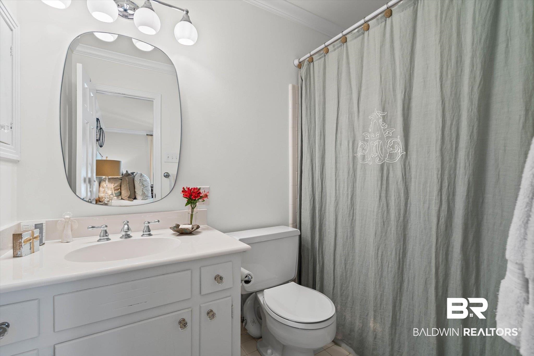 513 Spring Park Drive East Mobile, AL 36608 - Photo 14 of 44 Full bathroom featuring crown molding, vanity, and a shower with shower curtain