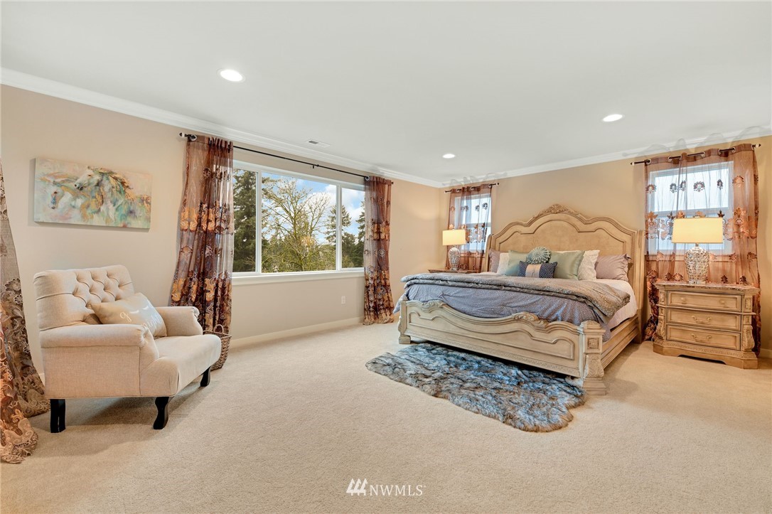 15927 98th Avenue Northeast Bothell, WA 98011 - Photo 17 of 33 a bedroom with a bed and a couch