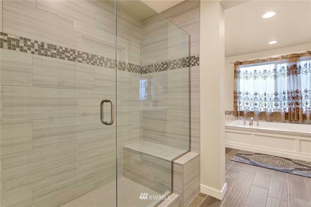 15927 98th Avenue Northeast Bothell, WA 98011 - Photo 18 of 33 a bathroom with a shower