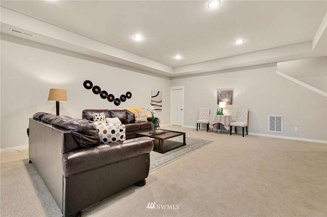 15927 98th Avenue Northeast Bothell, WA 98011 - Photo 27 of 33 a living room with furniture