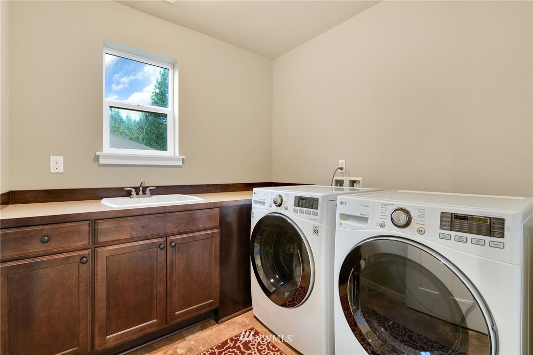 15927 98th Avenue Northeast Bothell, WA 98011 - Photo 30 of 33 a utility room with dryer and washer