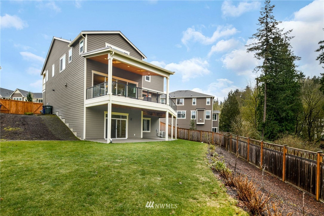 15927 98th Avenue Northeast Bothell, WA 98011 - Photo 32 of 33 a front view of a house with a garden