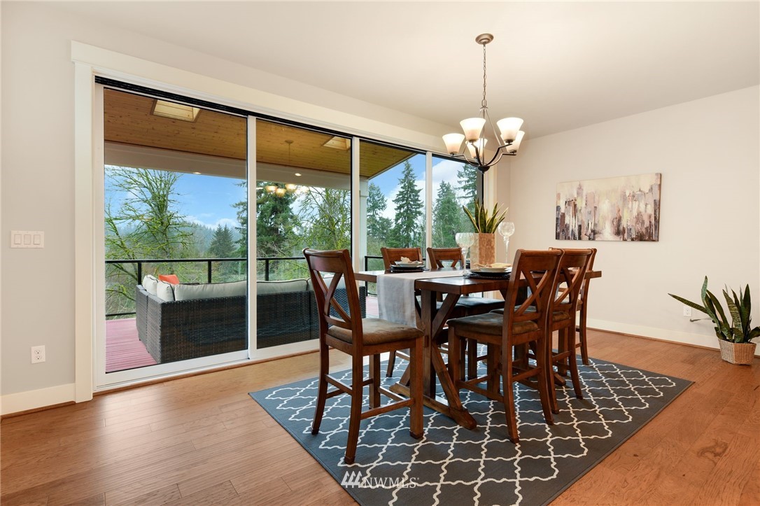 15927 98th Avenue Northeast Bothell, WA 98011 - Photo 5 of 33 a view of a dining room with furniture window and outside view