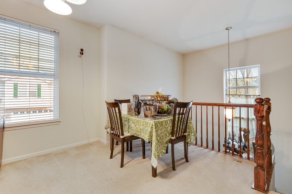 1358 Scarboro Road, Unit 806 Schaumburg, IL 60193 - Photo 7 of 16 a view of a dining room with furniture window and outside view