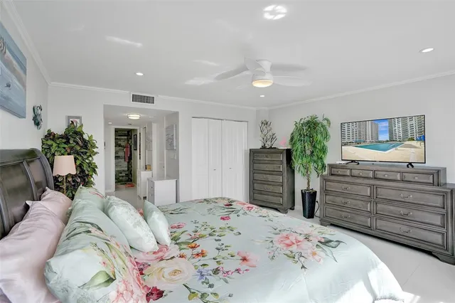a view of a balcony with chairs and a table