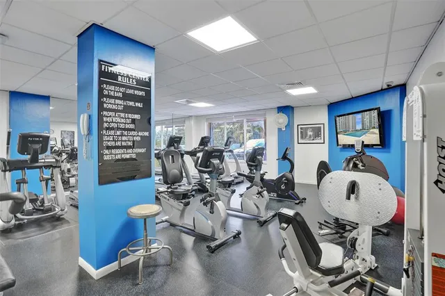 a view of a dining room with furniture large window and wooden floor