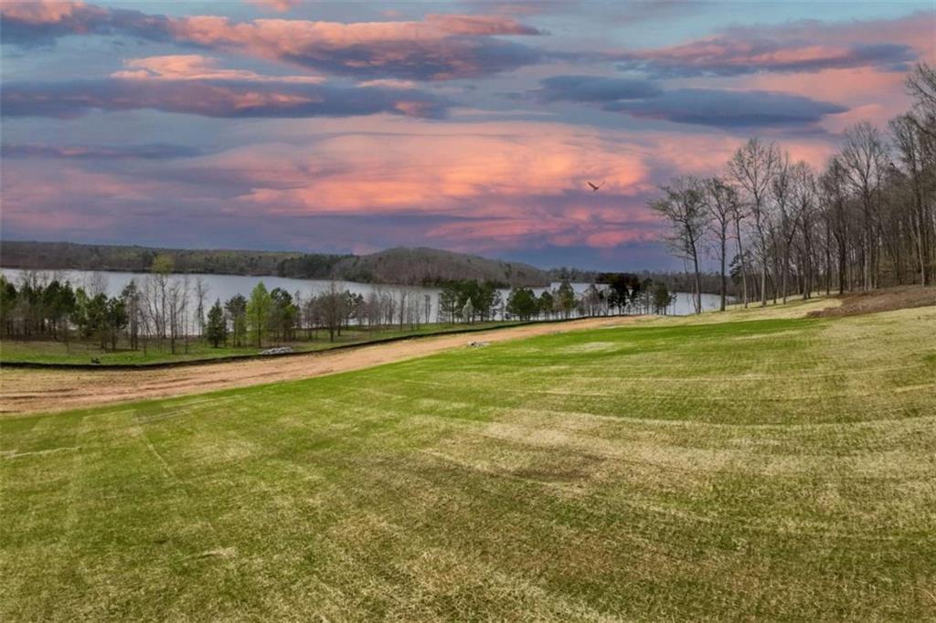 4540 Shirley Road Gainesville, GA 30506 - Photo 17 of 21 a view of a lake with a houses