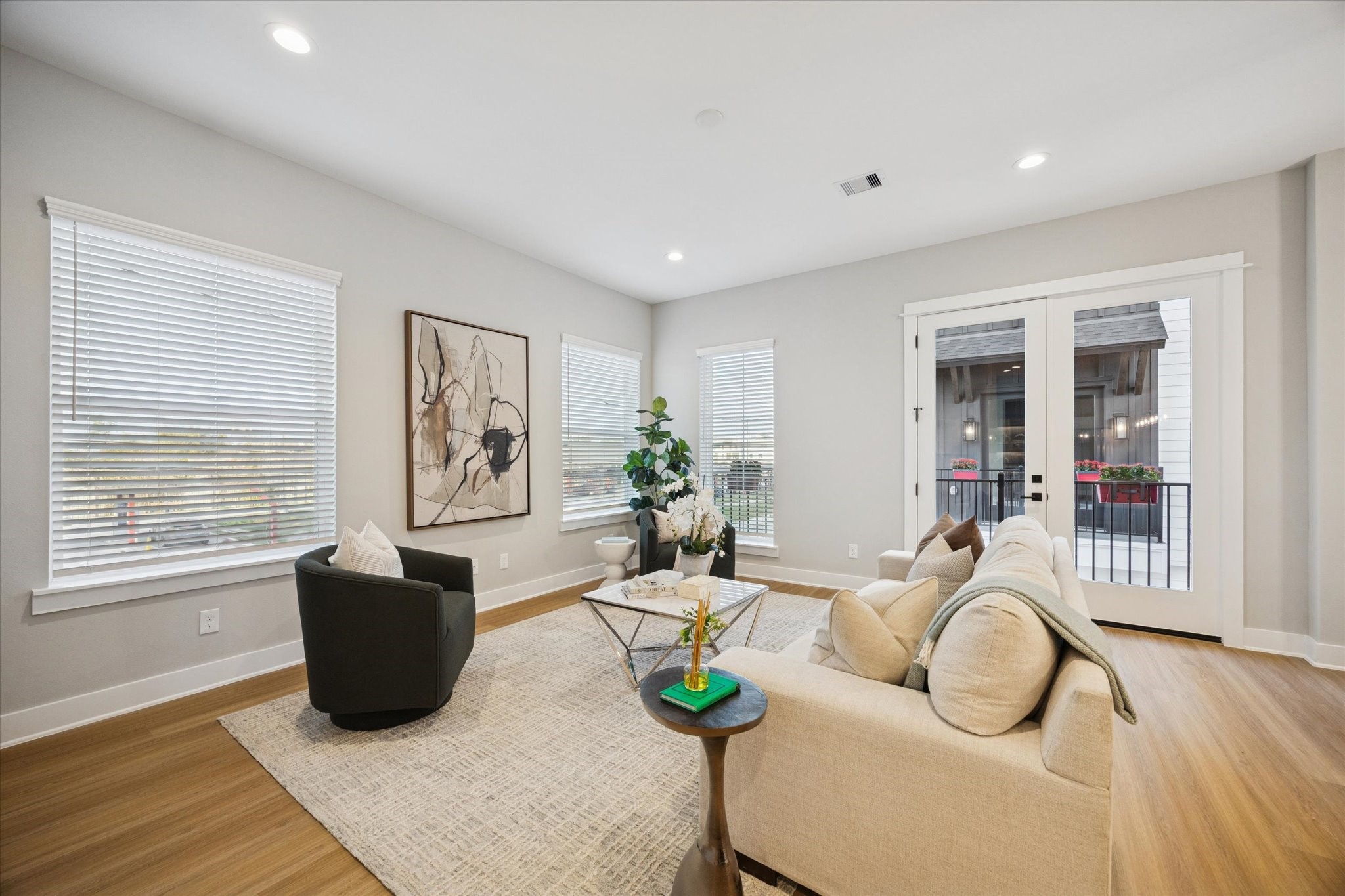 719 Thornton Road, Unit C Houston, TX 77018 - Photo 18 of 45 a living room with furniture and a wooden floor
