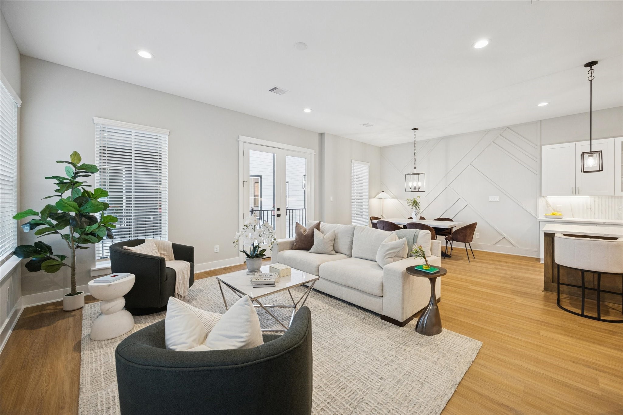 719 Thornton Road, Unit C Houston, TX 77018 - Photo 20 of 45 a living room with furniture and wooden floor