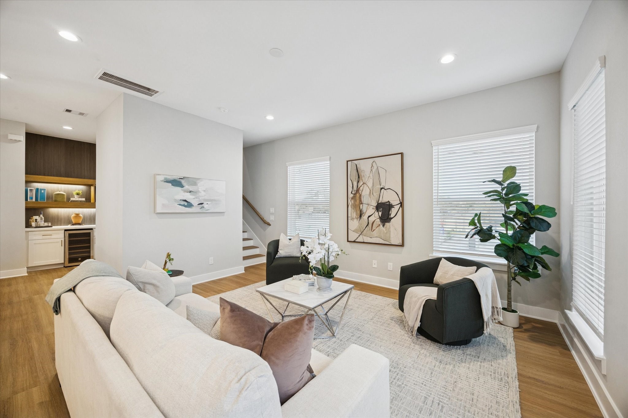 719 Thornton Road, Unit C Houston, TX 77018 - Photo 22 of 45 a living room with furniture and a potted plant