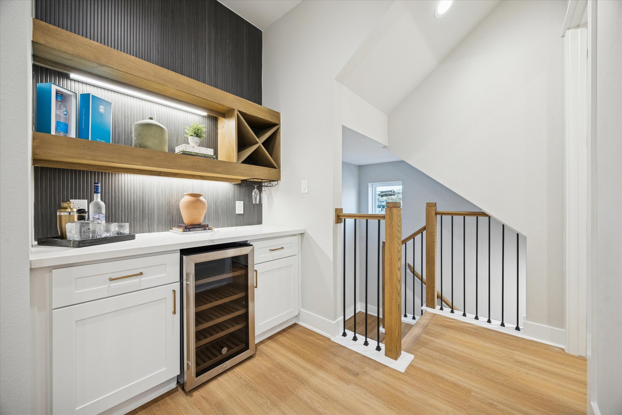 719 Thornton Road, Unit C Houston, TX 77018 - Photo 23 of 45 a view of a hallway with entryway and wooden floor