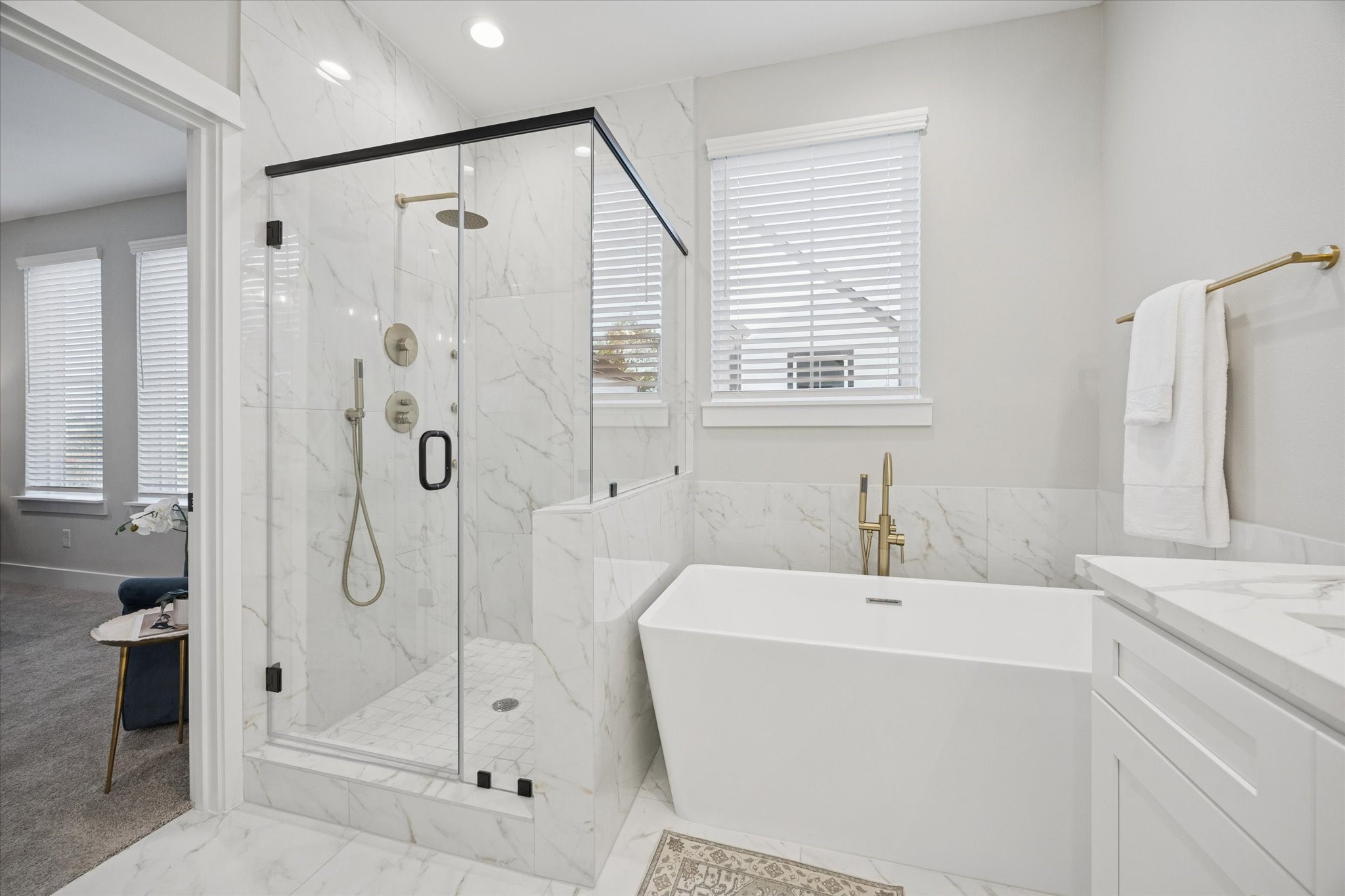 719 Thornton Road, Unit C Houston, TX 77018 - Photo 31 of 45 a bathroom with a shower sink and mirror