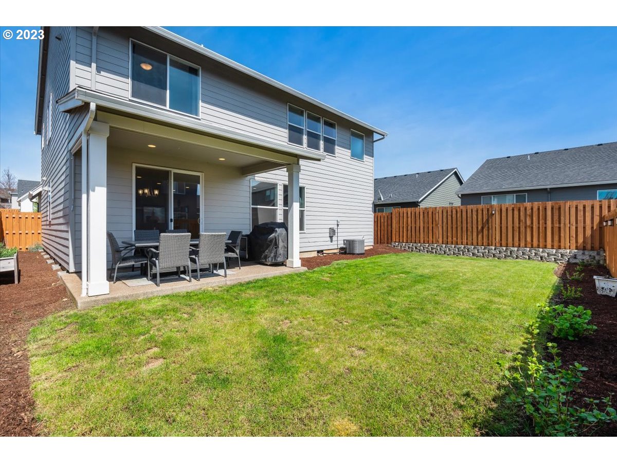 2754 Northwest Inna Avenue Salem, OR 97304 - Photo 29 of 36 a view of a house with porch and garden