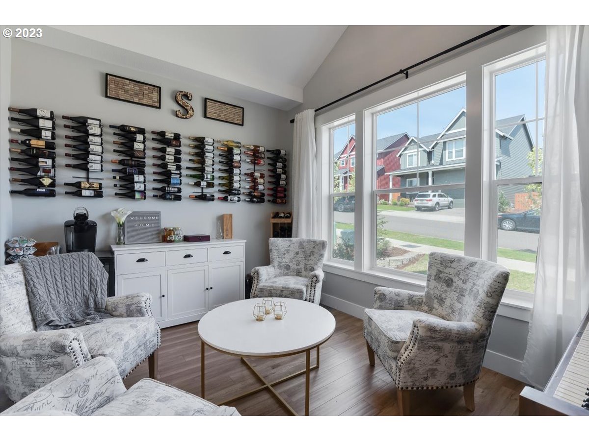 2754 Northwest Inna Avenue Salem, OR 97304 - Photo 4 of 36 a living room with furniture a rug and a large window