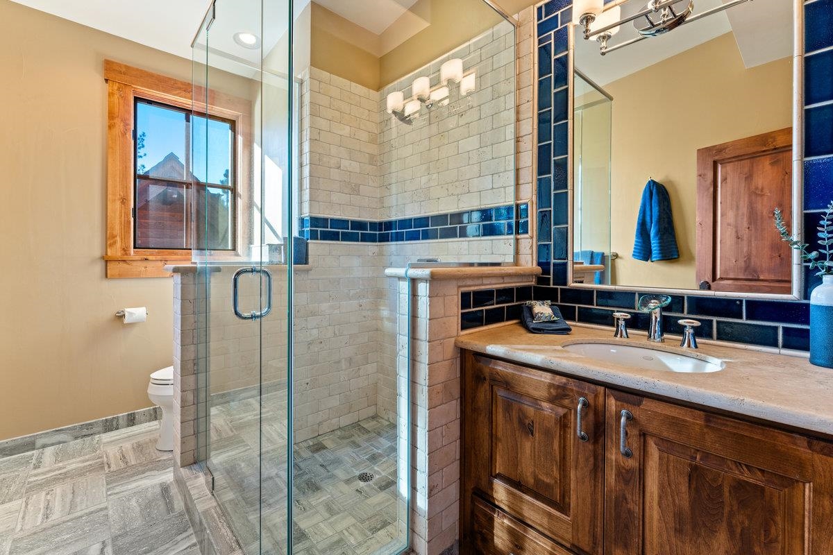 610 Joseph Bernard Truckee, CA 96161 - Photo 12 of 21 a bathroom with a granite countertop sink and a mirror