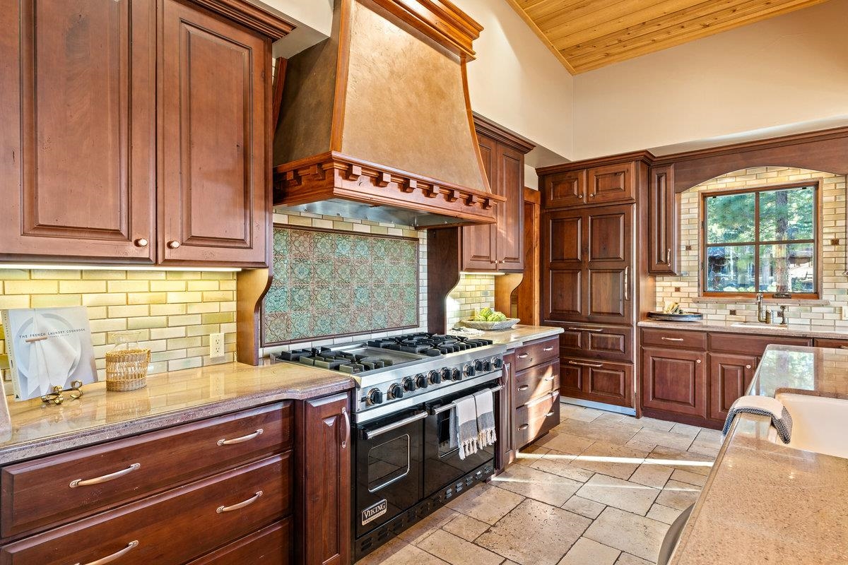 610 Joseph Bernard Truckee, CA 96161 - Photo 6 of 21 a kitchen with stainless steel appliances granite countertop a stove and a sink