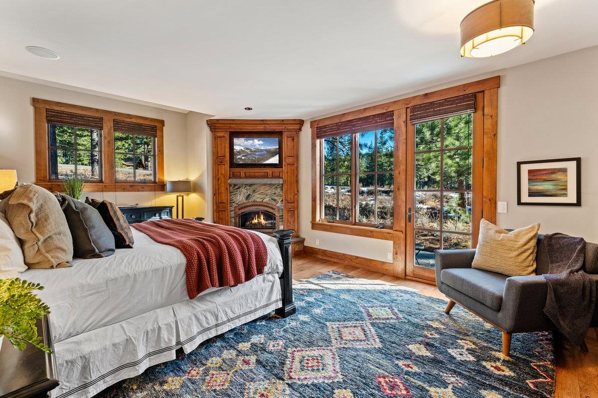 610 Joseph Bernard Truckee, CA 96161 - Photo 8 of 21 a spacious bedroom with a bed and glass window