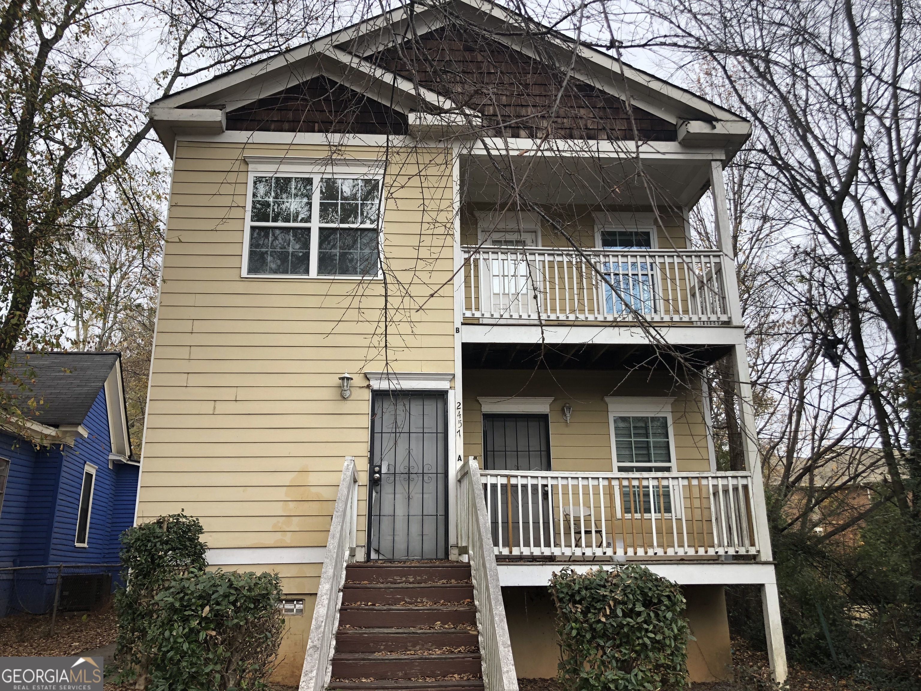 a front view of a house with balcony