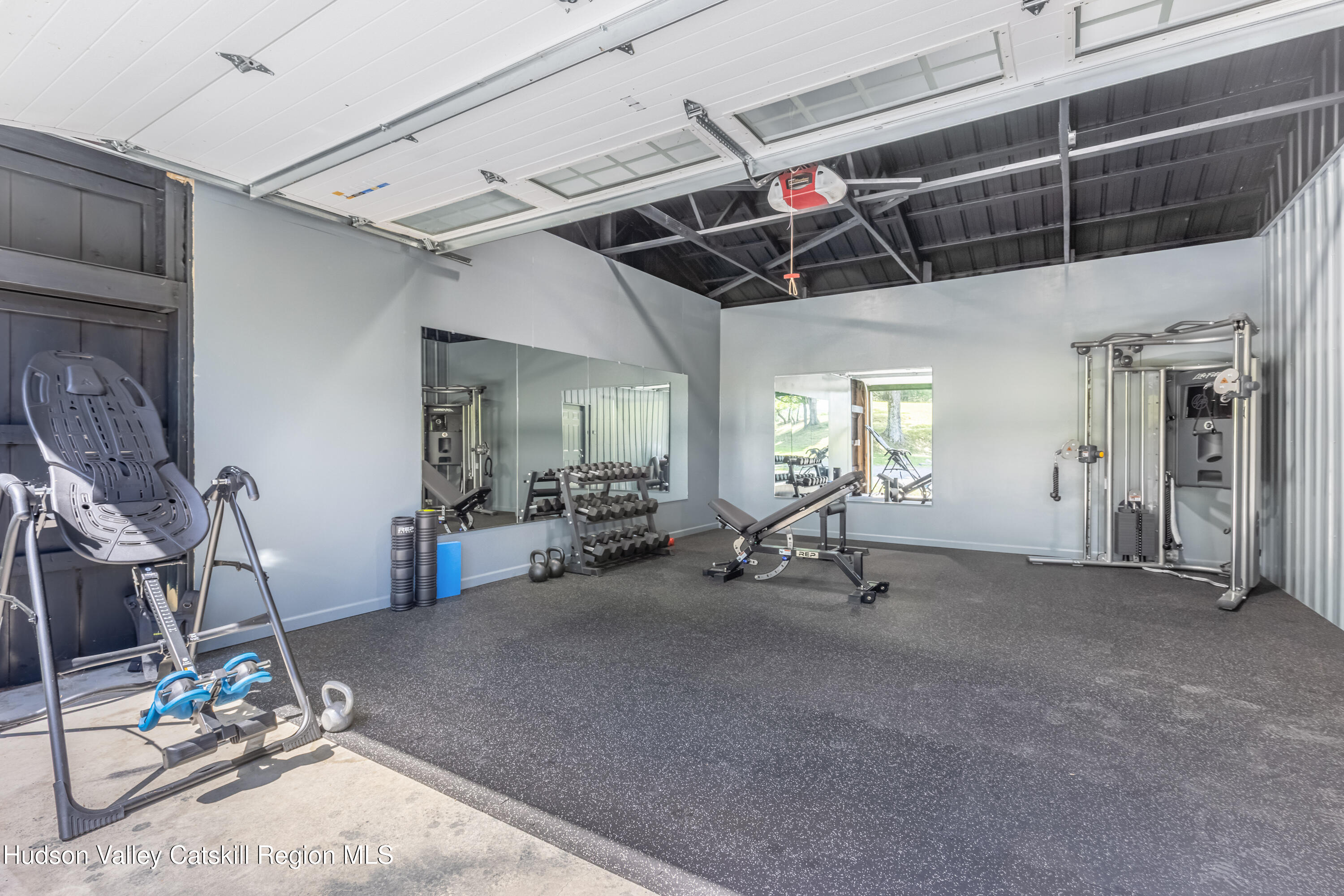 688 Bruce Porn Road Gilboa, NY 12167 - Photo 94 of 104 a view of a room with gym equipment