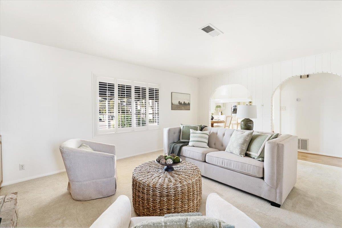 172 West Phillips Road Watsonville, CA 95076 - Photo 14 of 42 a living room with furniture and a window