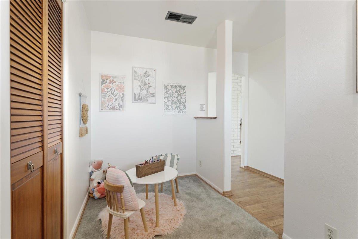 172 West Phillips Road Watsonville, CA 95076 - Photo 17 of 42 a view of a hallway with chairs and closet