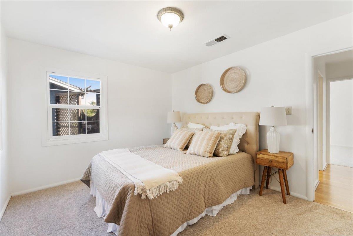 172 West Phillips Road Watsonville, CA 95076 - Photo 20 of 42 a bedroom with a bed and a window