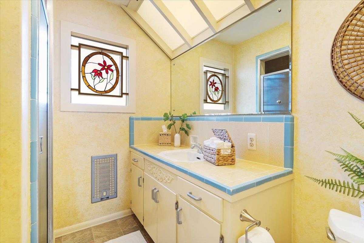 172 West Phillips Road Watsonville, CA 95076 - Photo 22 of 42 a bathroom with a sink and a mirror